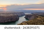 Cove Palisades State Park - September 5th 2020: Wildfire smoke obscures the sun over the Crooked River arm of Lake Billy Chinook.