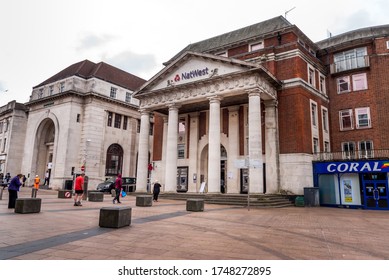 Coventry Ciy/ United Kingdom - 3 June 2020 : Long Queue Of People Observing Social Distancing Going To Natwest Bank. Public Obeserving Social Distancing Going To The Bank While Raining, 