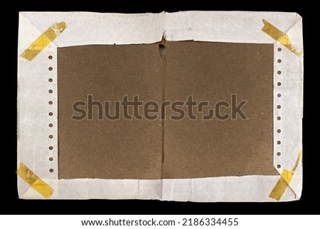 Cover of an old notebook covered in dot-matrix printer paper