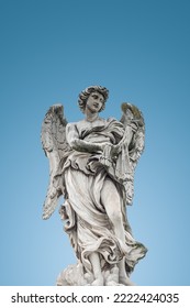 Cover page and statue beautiful holy angel and wings at the Saint Angel bridge at blue sky gradient background  Rome  Italy  and copy space
