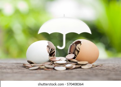 Coverage, Insurance Or Protection Concept, Stacks And Heaps Of Coins, Umbrella Nature Background