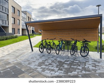 covered bicycle parking in a residential area - Powered by Shutterstock