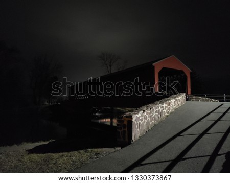 Covered bridge at night, specifically Sachs Bridge in Gettysburg Pennsylvania.