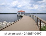 Covered lake view shelter at the end of New Broad Street in Baldwin Park, Orlando, Florida, USA.