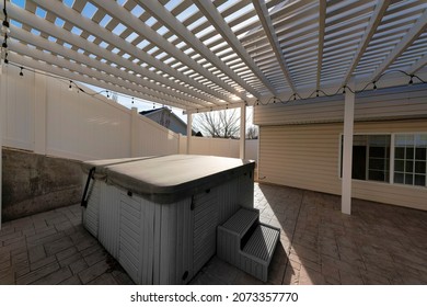 Covered Portable Spa Pool At The Backyard Of A House