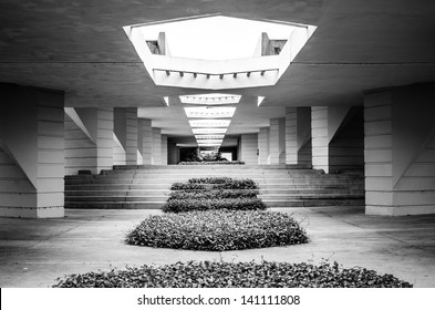 Covered walkway in monochrome image