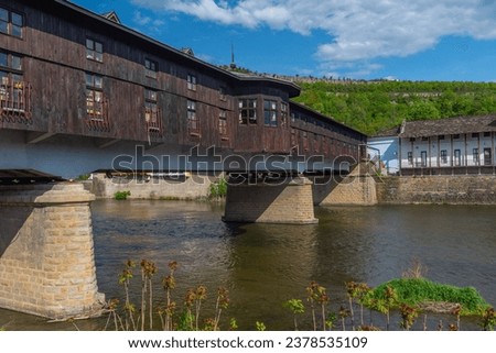 Covered wooden bridge in the town of Lovech in Bulgaria over the Osam river.