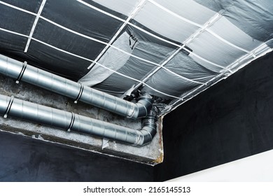 Covering The Ceiling With Thermal Insulation Materials. Construction Of A Ventilation System From Metal Pipes. Insulation And Installation Of Air Conditioning And Heating Systems At Home. 