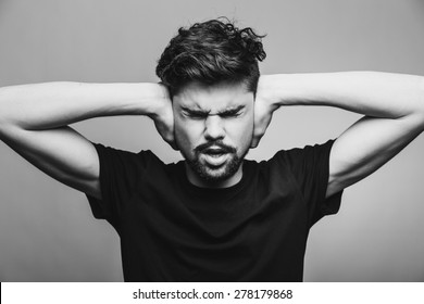 https://image.shutterstock.com/image-photo/covering-his-ears-hands-260nw-278179868.jpg