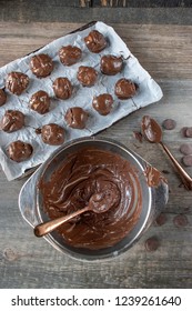 Covering Peanut Butter Balls With Melted Chocolate Flat Lay