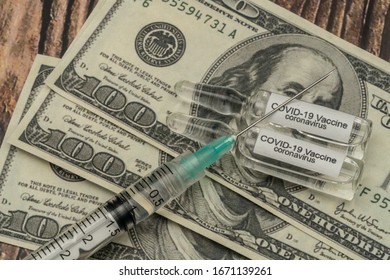 COVID 19 Coronavirus Vaccine And Syringe Injection It Use For Prevention, Immunization And Treatment From COVID-19 On Us Dollars, Medicines Business