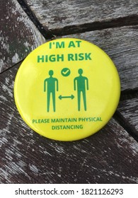 Covid 19 High Risk, London, UK - 24.09.2020: High Risk Coronavirus Covid-19 Social Distancing Distance  Warning Badge Button Pin To Be Worn By People Shielding And Vulnerable To Covid-19 Coronavirus 