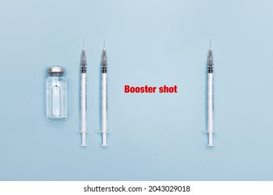 Covid Booster Shots. How Long Between Covid-19 Vaccine Doses. First Dose And After 21 Days Second Dose.  Vaccine Syringe And A Vial For Covid-19 Immunization Race For Healthcare