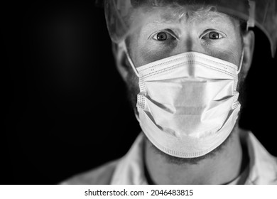 Covid Doctor And Health Care Worker, Putting On A Mask And Face Shield, While Wearing A Lab Coat And Gloves In Australia.