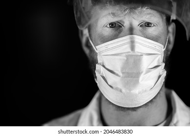 Covid Doctor And Health Care Worker, Putting On A Mask And Face Shield, While Wearing A Lab Coat And Gloves In Australia.