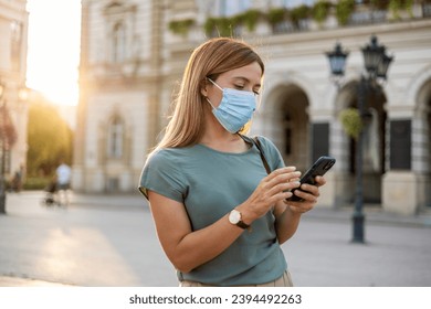 Covid face mask, phone gps and woman on the internet in a road for location in the urban city. Business person doing search on web with technology and covid 19 in the street of town. - Shutterstock ID 2394492263