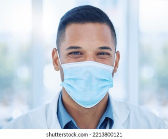 Covid, Face Mask And Portrait Of A Happy Doctor In A Hospital Working, Smiling And Helping With Healthcare Expertise. Smile, Compliance And Medical Worker With Coronavirus Safety Protection In India