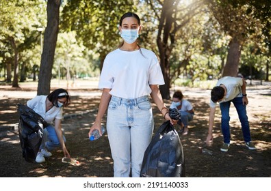 Covid, Face Mask And Volunteer Worker Cleaning Park, Doing Community Service And Helping Pick Up Trash And Plastic Bottles. Support Team Of Activists Recycling, Working Together To End Pollution