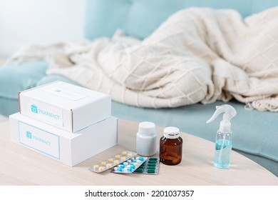 Covid First Aid Box Self Recover Health Care Of Woman Patient Fever, Cold Or Sick Her Sleep On Sofa. Customer Delivery Service From Hospital Online Clinic Retail Rx Drug Store In E-commerce Home Order