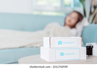 Covid First Aid Box Self Recover Health Care Of Woman Patient Fever, Cold Or Sick Her Sleep On Sofa. Customer Delivery Service From Hospital Online Clinic Retail Rx Drug Store In E-commerce Home Order