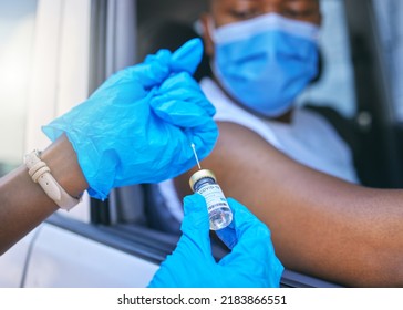 Covid, Medical Worker And Vaccine Site And Service For Patient Getting Flu Shot Or Dose For Coronavirus Prevention. Man In Car With Face Mask To Avoid Contact While Getting Injection