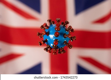 Covid model on Union Jack flag UK