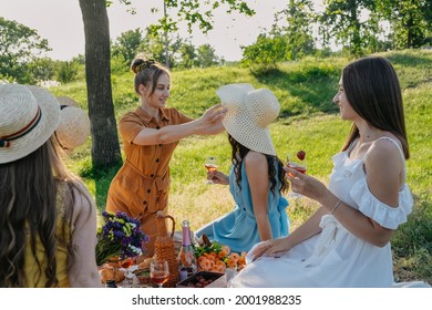 COVID Safe Summer Picnic. Summer Party Ideas. Safe And Festive Ways To Host Small, Outdoor Gathering With Friends. People Safely Get Together. Young Women Girl Friends At Picnic.