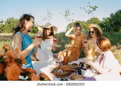 COVID Safe Summer Picnic. Summer Party Ideas. Safe And Festive Ways To Host Small, Outdoor Gathering With Friends. People Safely Get Together. Young Women Girl Friends At Picnic.