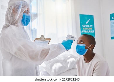 Covid Screening, Measuring Temperature And Mask Wearing With A Doctor Treating A Patient In The Hospital. Health, Safety And Medicine With A Female Medical Practitioner And Healthcare Professional