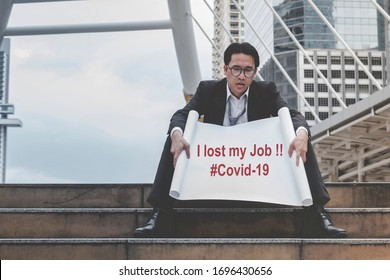 Covid Stress Unemployment Businessman Failure Lost Job From Coronavirus Epidemic Crisis. Business Man Holding Sign Of Lost Job Due To Covid-19. Stress Man Unemployed Jobless Lay Off Despair Stressful