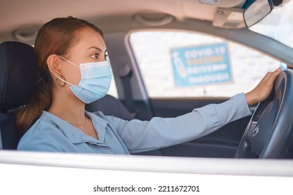 Covid Vaccine, Car Drive And Woman With Face Mask For Safety, Compliance And Healthcare At An Outdoor Clinic Or Hospital. Person In Vehicle At Covid 19 Drive Thru For Corona Virus Medical Vaccination