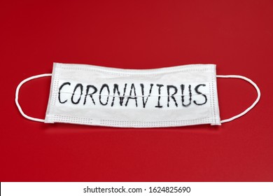 Сoronavirus    COVID  19    2019  nCoV  WUHAN virus concept  Surgical mask protective mask and CORONAVIRUS text  Chinese coronavirus COVID  19 outbreak  Red background 