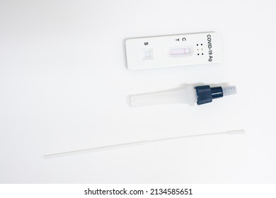 COVID-19, Antigen test kit (ATK) with a nasal swab on white background.Rapid antigen test kit for self test at home.Antigen test kit for self collect nose swab.COVID-19 coronavirus pandemic protection - Shutterstock ID 2134585651