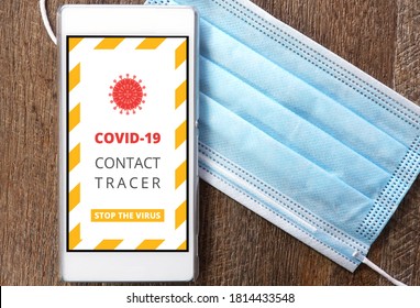 Covid-19 Contact Tracer App On Smart Phone With Face Mask                               