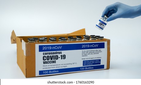 Covid-19 Corona Virus 2019-ncov Vaccine Vials Medicine Drug Bottles Injection Blue Nitrile Surgical Gloves Box. Vaccination, Immunization, Treatment To Cure Covid 19 Corona Virus Infection Concept.