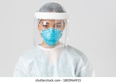 Covid-19, Coronavirus Disease, Healthcare Workers Concept. Close-up Of Confident Serious-looking Female Tech Lab Employee, Doctor In Personal Protective Equipment, Respirator And Face Shield