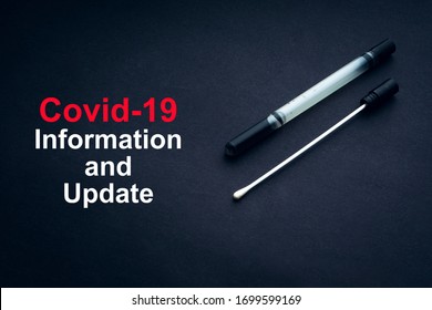 COVID-19 or CORONAVIRUS INFORMATION AND UPDATE text with medical swab on black background. Covid-19 or Coronavirus concept. 