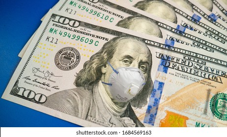 COVID-19 Coronavirus In USA, 100 Dollar Money Bill With Face Mask. Crisis And Finance Concept