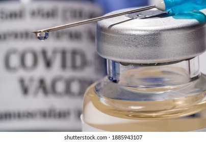 Stock photo of Covid-19 vaccine bottle and syringe