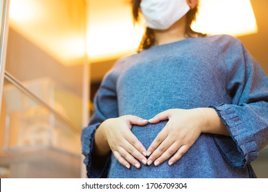 Covid-19 Coronavirus Variants.surrogacy Mother Pregnant Tummy Woman Mom With Mask For Protection Tummy Baby.lockdown.Vaccinated Pregnant Mother.vaccine.delta.love Maternity.vaccine Hpv.ivf Treatment.