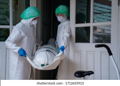 
COVID-19 DEAD: Death increases every day. Staff wrapped up the dead bodies of Coronavirus covid-19 infection - Shutterstock ID 1712655913