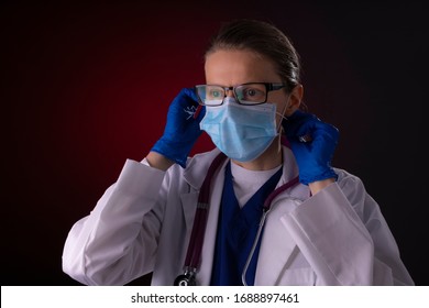 COVID-19 Healthcare Worker Using PPE Protective Equipment. Nurse Or Doctor Theme Preparing For Virus Treatment.