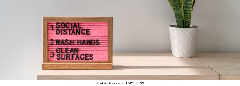 COVID-19 hygiene practices for Coronavirus prevention banner. Text board in public space with rules, practice social distancing, wash hands often, clean surfaces, sanitizing surfaces. - Powered by Shutterstock