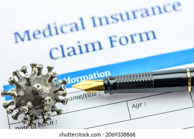 Covid-19 Insurance, Healthcare Concept : Coronavirus Model On A Medical Insurance Claim Form With A Pen, The Insurance Will Cover All Costs When An Insurer Or A Policy Holder Is Infected With COVID-19