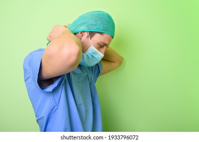 Covid-19. Male Nurse Puts On Protective Cloths. Personal Protective Equipment In The Fight Against Coronavirus Disease . High Quality Photo