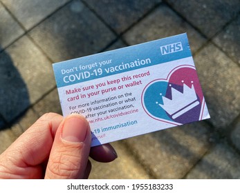 Covid-19 Passport Id Card , London, UK - 03.31.2021: Covid 19 Vaccine Passport Id Card Concept  For Restrictions On Travel And Venue Admission In UK