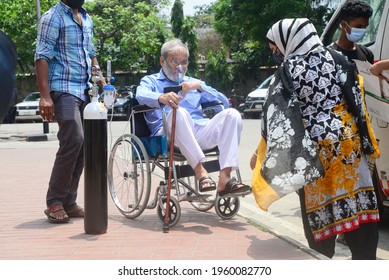 A Covid-19 Patient Is Being Taken To Dhaka North City Corporation COVID-19 Dedicated Hospital With His Family Members For Treatment In Dhaka, Bangladesh, On April 21, 2021