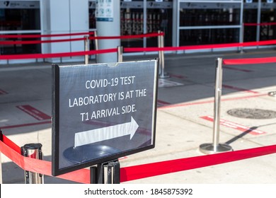 COVID-19 test laboratory signpost at the airport - Shutterstock ID 1845875392