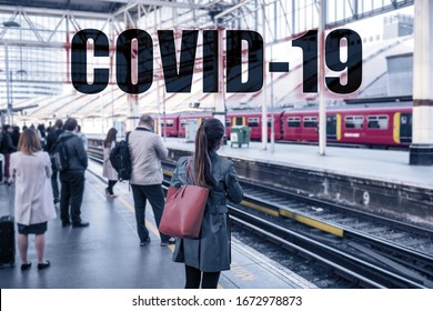 COVID-19 Text Sign Over Travellers Commuting At Train Station. Travel Ban Quarantine For Public Transport Over Corona Virus Fear. Coronavirus Panic Social Distancing People.