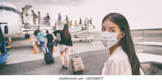 COVID-19 Travel Airport Asian woman tourist boarding plane for holiday wearing face mask. PPE Corona virus Coronavirus negative test and vaccine passport banner panoramic.